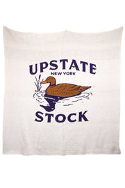 Blanket with 'Upstate New York Stock' text and duck illustration on a white background